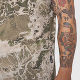 Laser-Vent Training Tee in Realtree WAV3 camo pattern, worn by model showing sleeve and torso