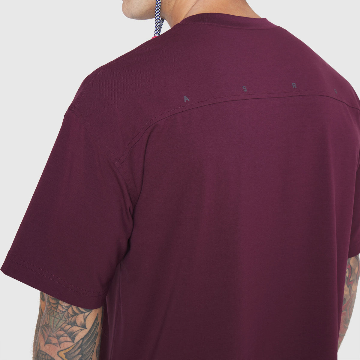 SUPIMA® Ice-Skin™ Reversible Tee in Merlot, back view on model