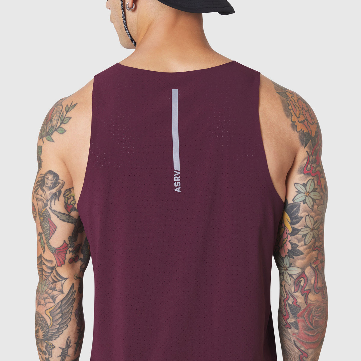 Aerotex Perforated Run Tank in merlot, back view on model with tattoos