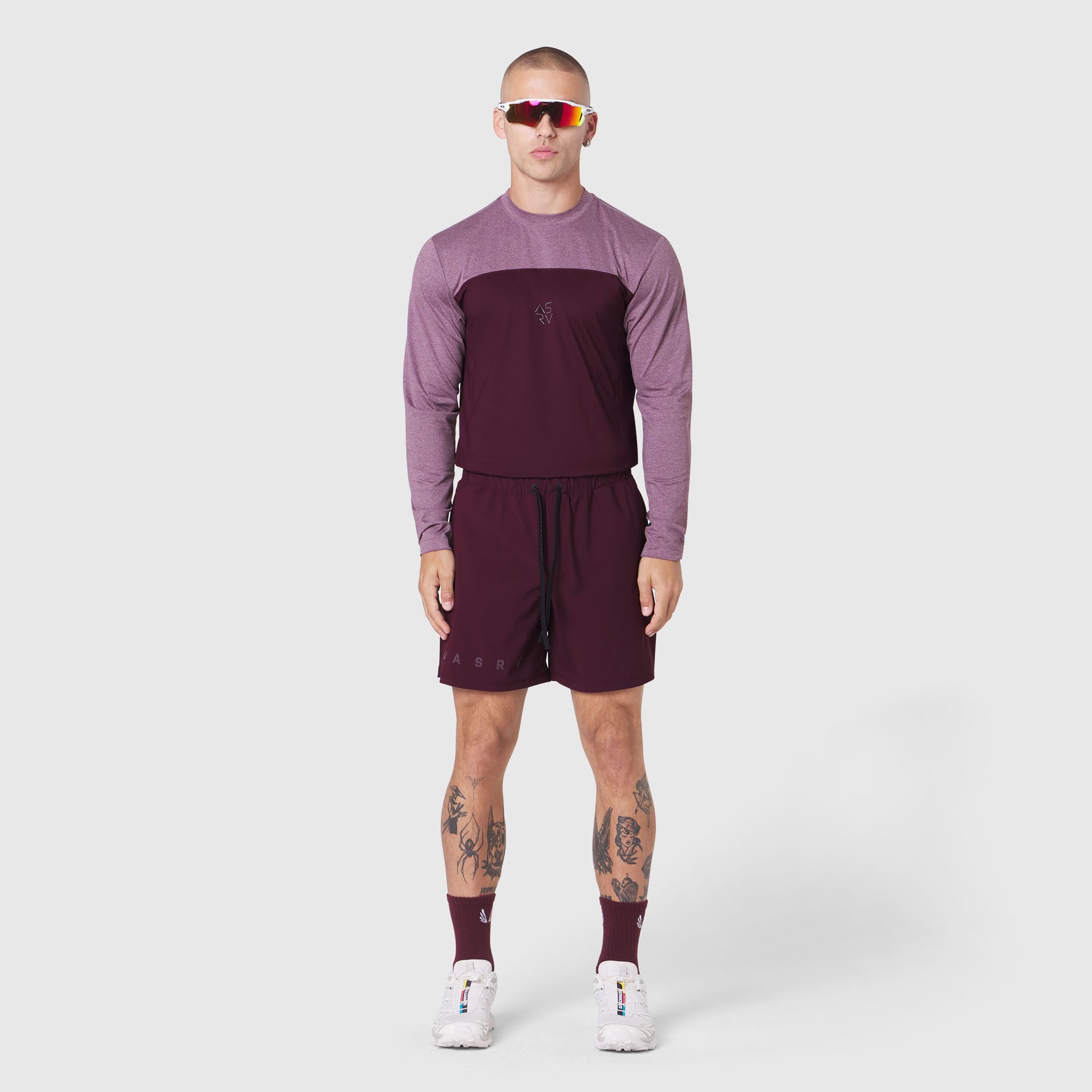 AEROSILVER® UPF50+ Run Long Sleeve in merlot and mauve, worn with matching shorts, front view