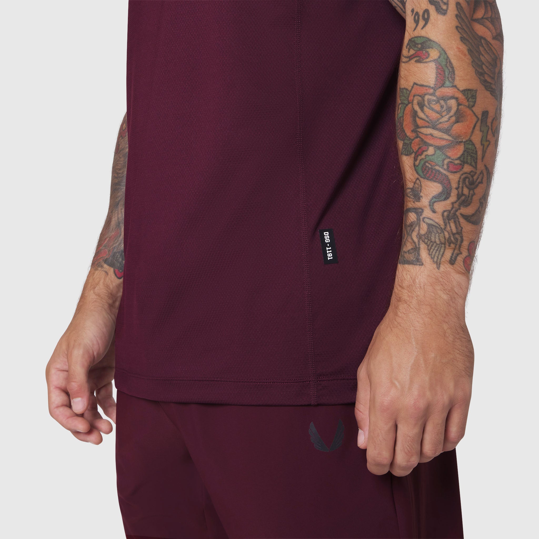 AEROSILVER® UPF50+ Run Tee in merlot worn by model, side view