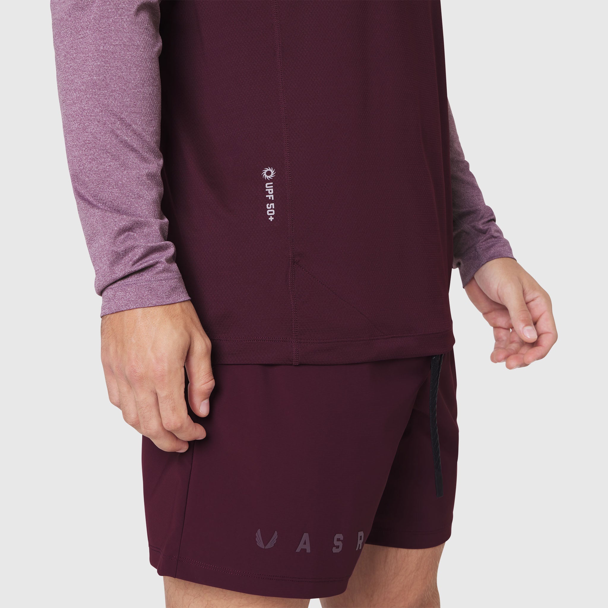Revolutional Training Short in Merlot, worn by model showing front side view