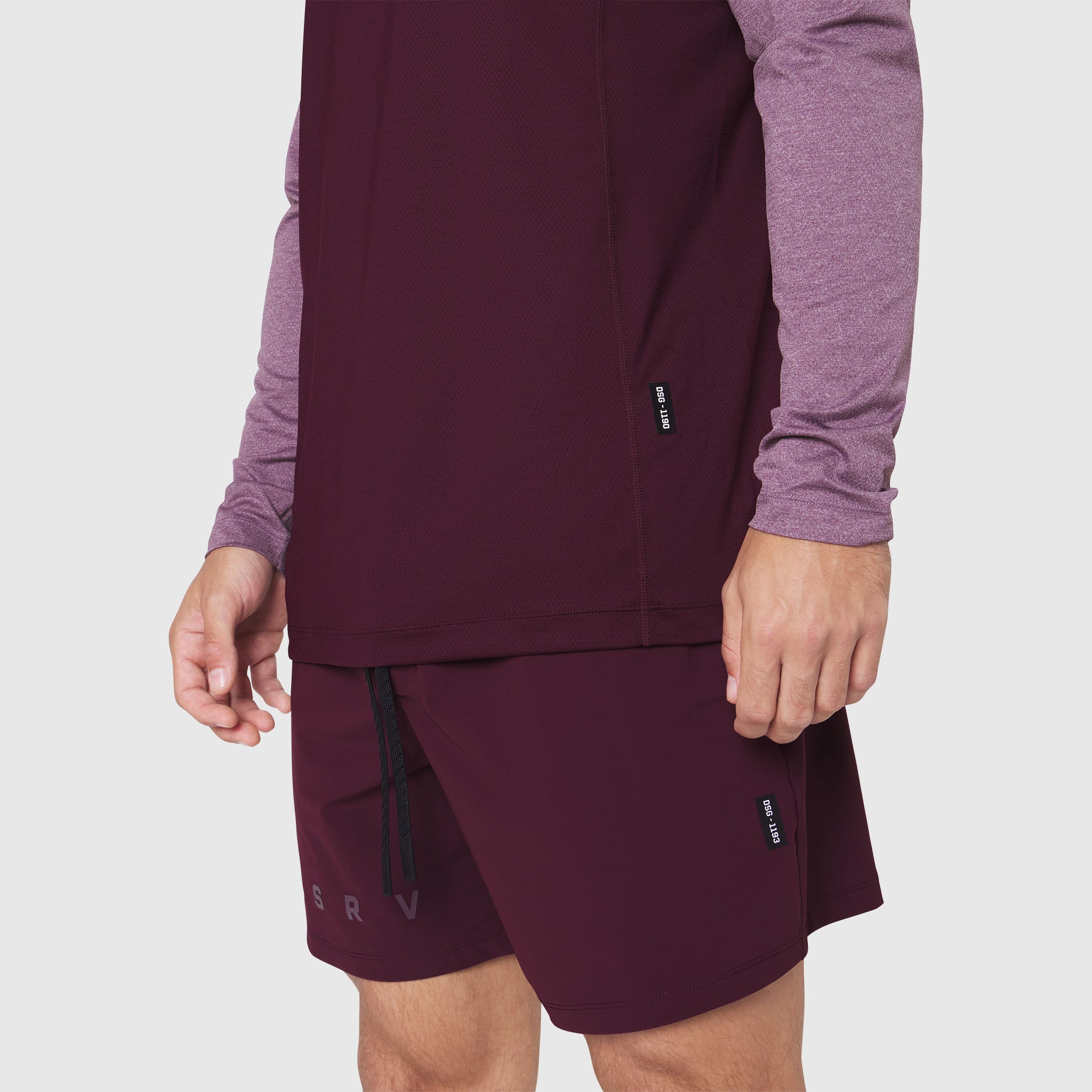 Revolutional Training Short in Merlot, worn by model showing front and side view