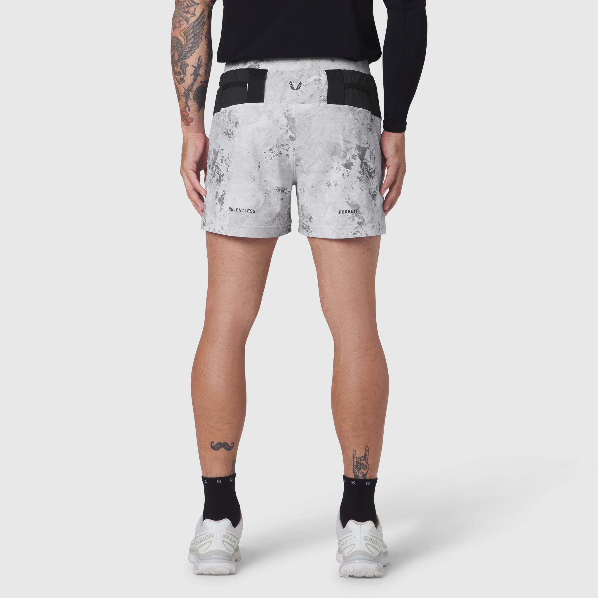 Aerotex Distance Run Short in Sedona Snow Camo worn by model, back view