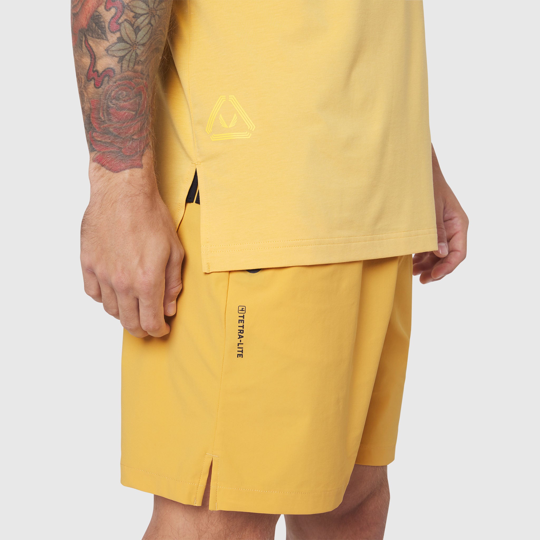 TETRA-LITE® 5" Linerless Training Short in Amber, worn by model, side view