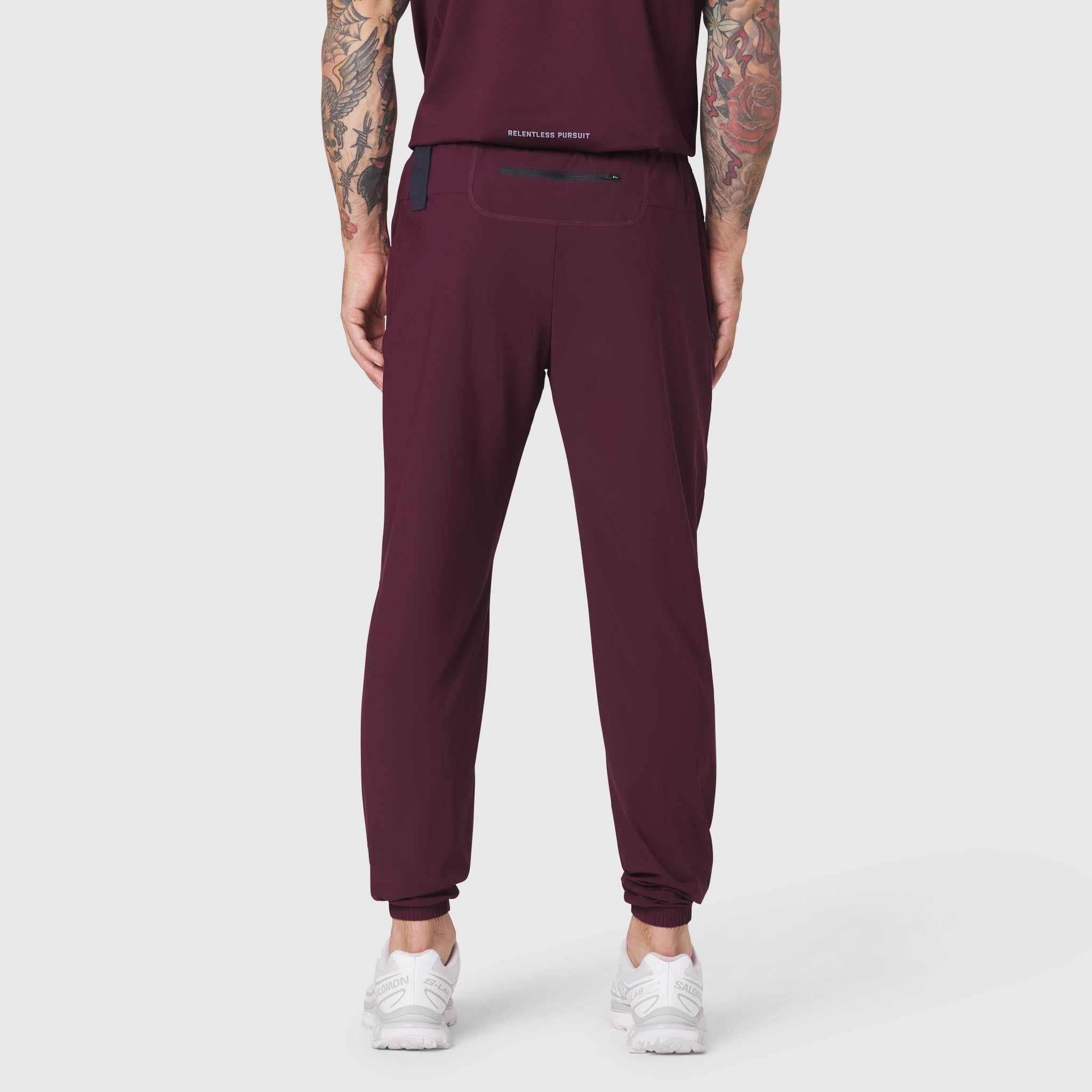 Tetra-Lite Training Jogger in merlot, back view on model