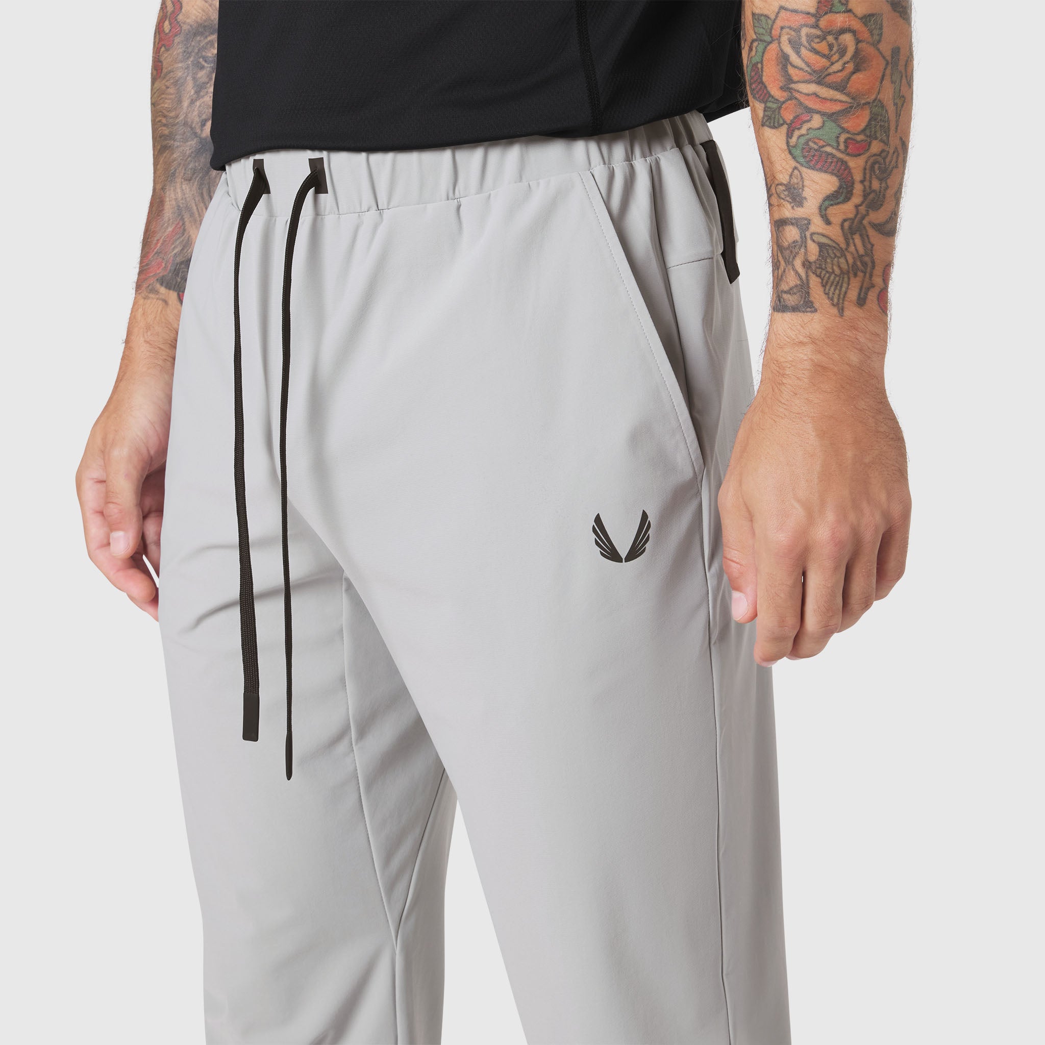 TETRA-LITE Training Jogger in slate grey worn by model, front view detail