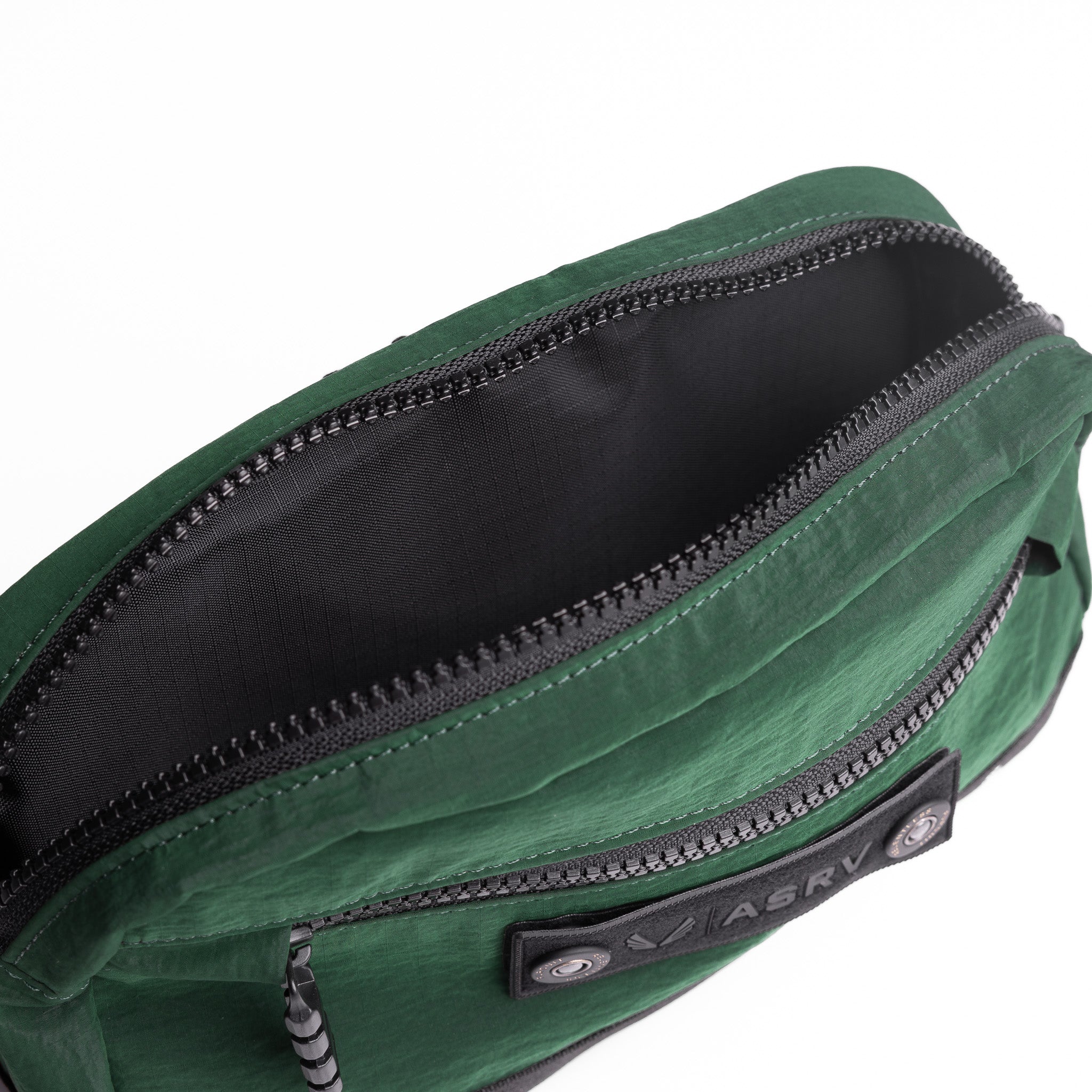 Flatlay 1231 Ripstop Crossbody Bag in Forest Green, open interior view