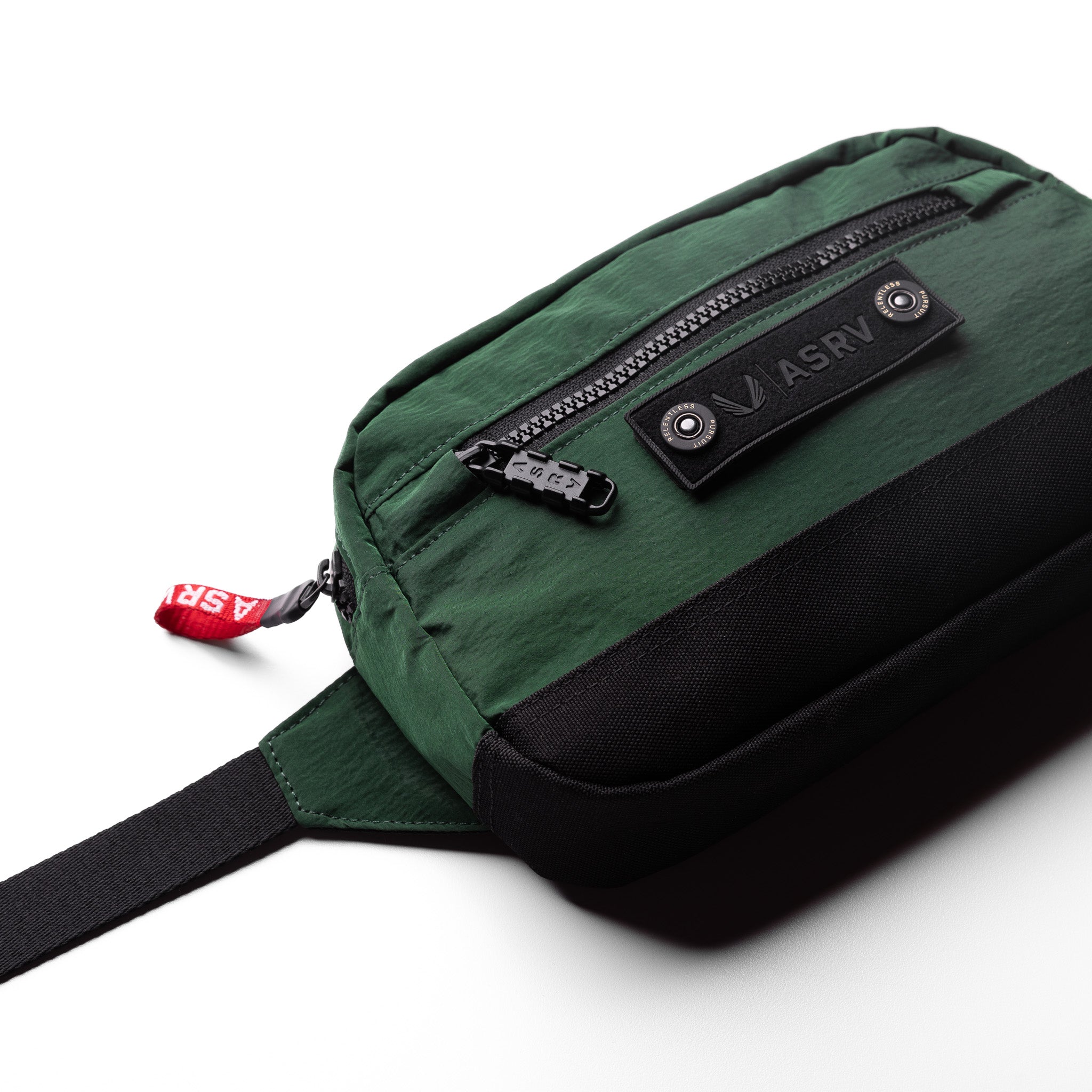 1231 Ripstop Crossbody Bag in forest green, worn with black strap