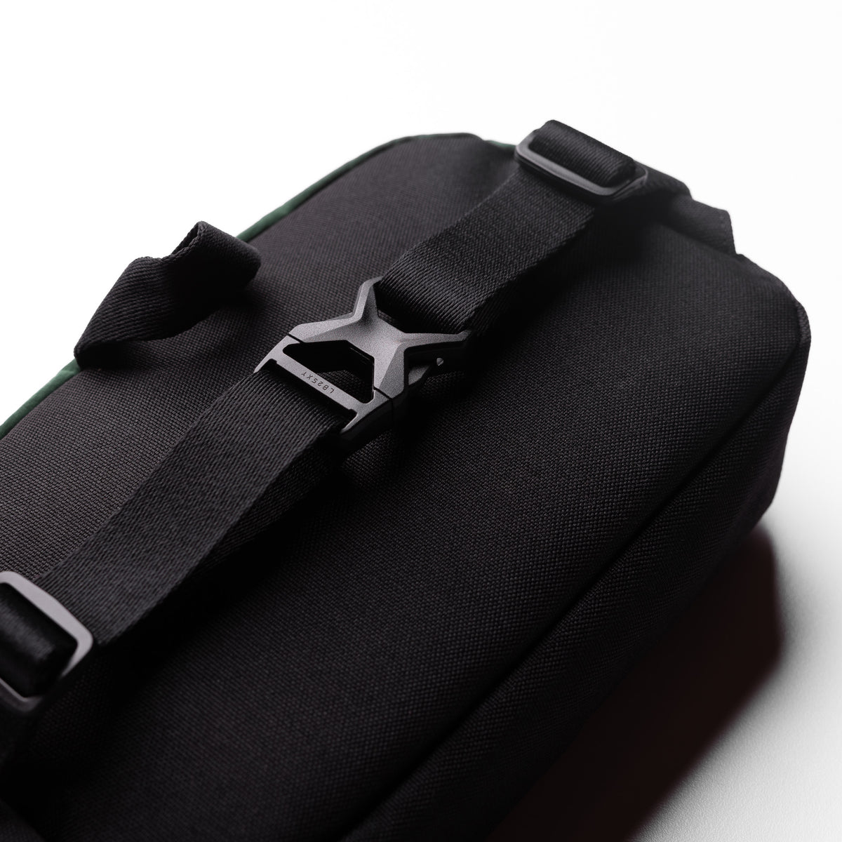Flatlay 1231. Ripstop Crossbody Bag in Forest Green, top view with strap detail