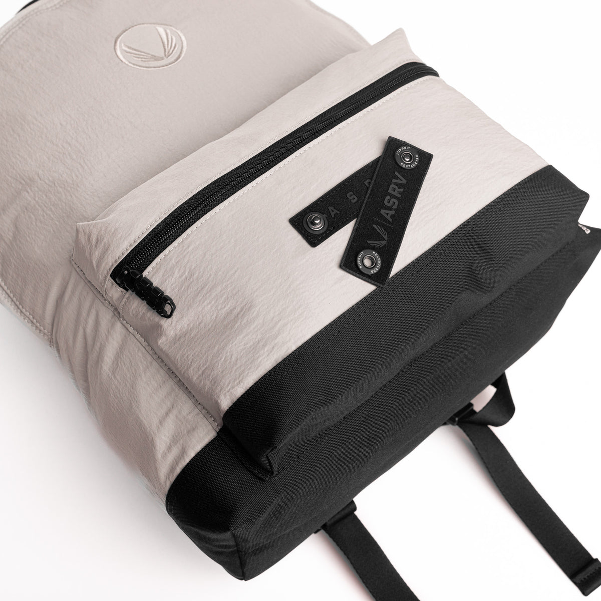 Flatlay 1233 Ripstop Backpack in Chai, front view with open compartments