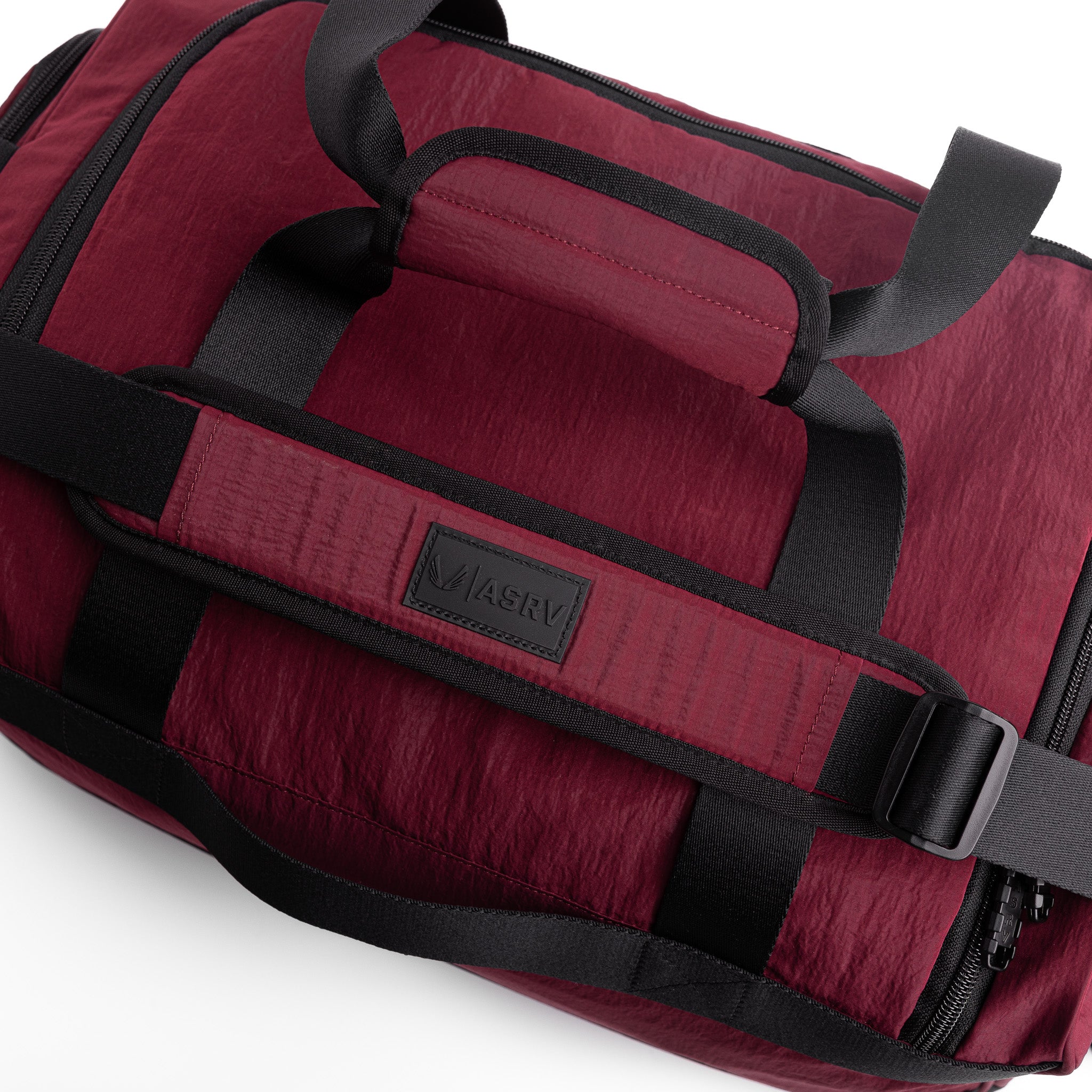 Flatlay 1234 Ripstop Duffle Bag in Crimson, angled view