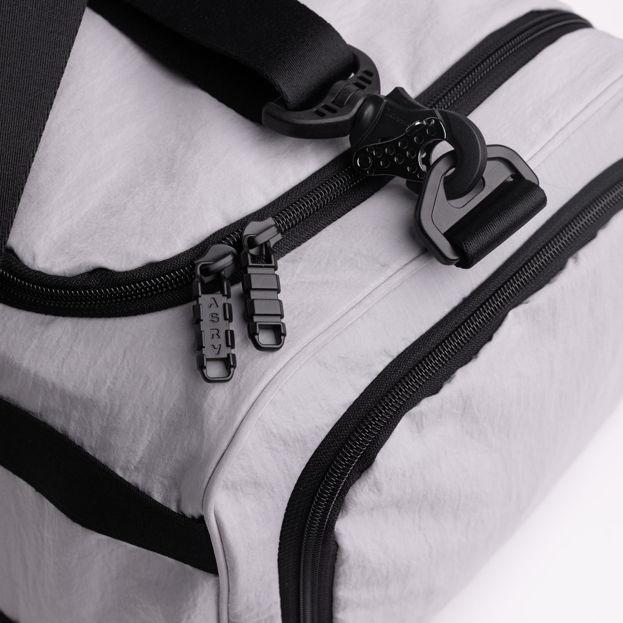 Flatlay 1234 Ripstop Duffle Bag in Slate Grey, detail view of zippers and handles