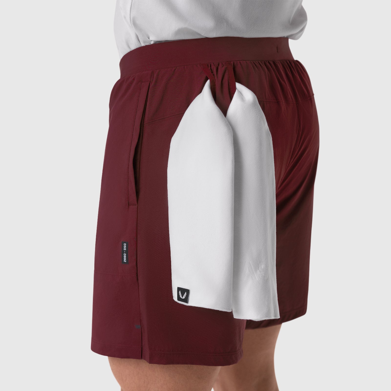 Aerotex™ 6" Training Short in Crimson worn by model, front view with white liner visible