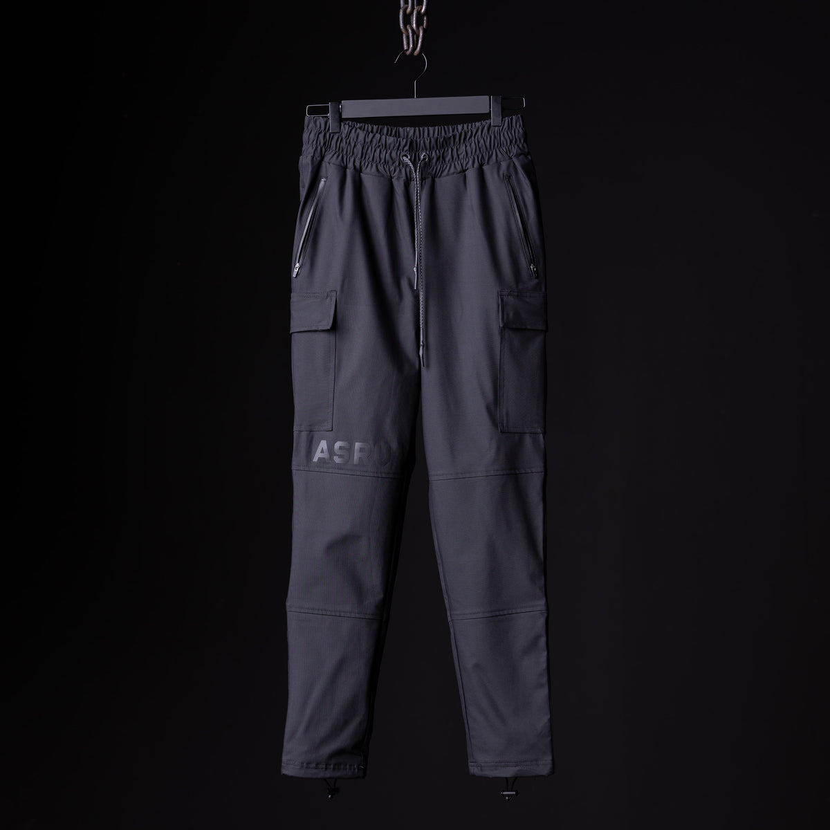 SP'20 Cargo Track Pant in charcoal grey with cargo pockets, front view