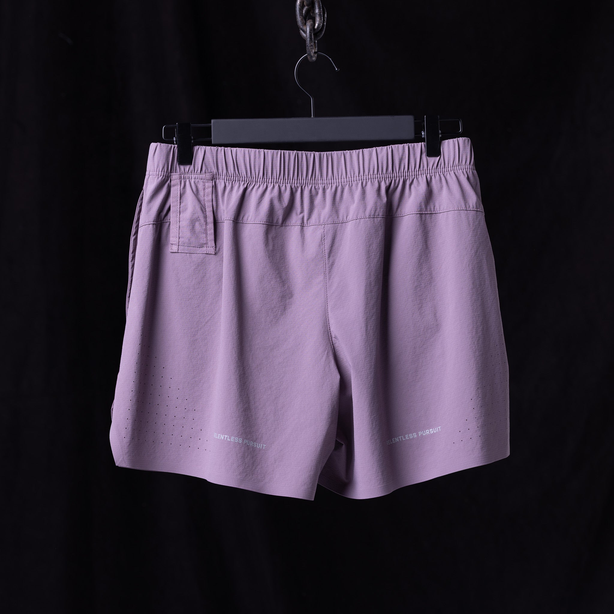WN'23 6" Perforated Short in lavender purple, back view