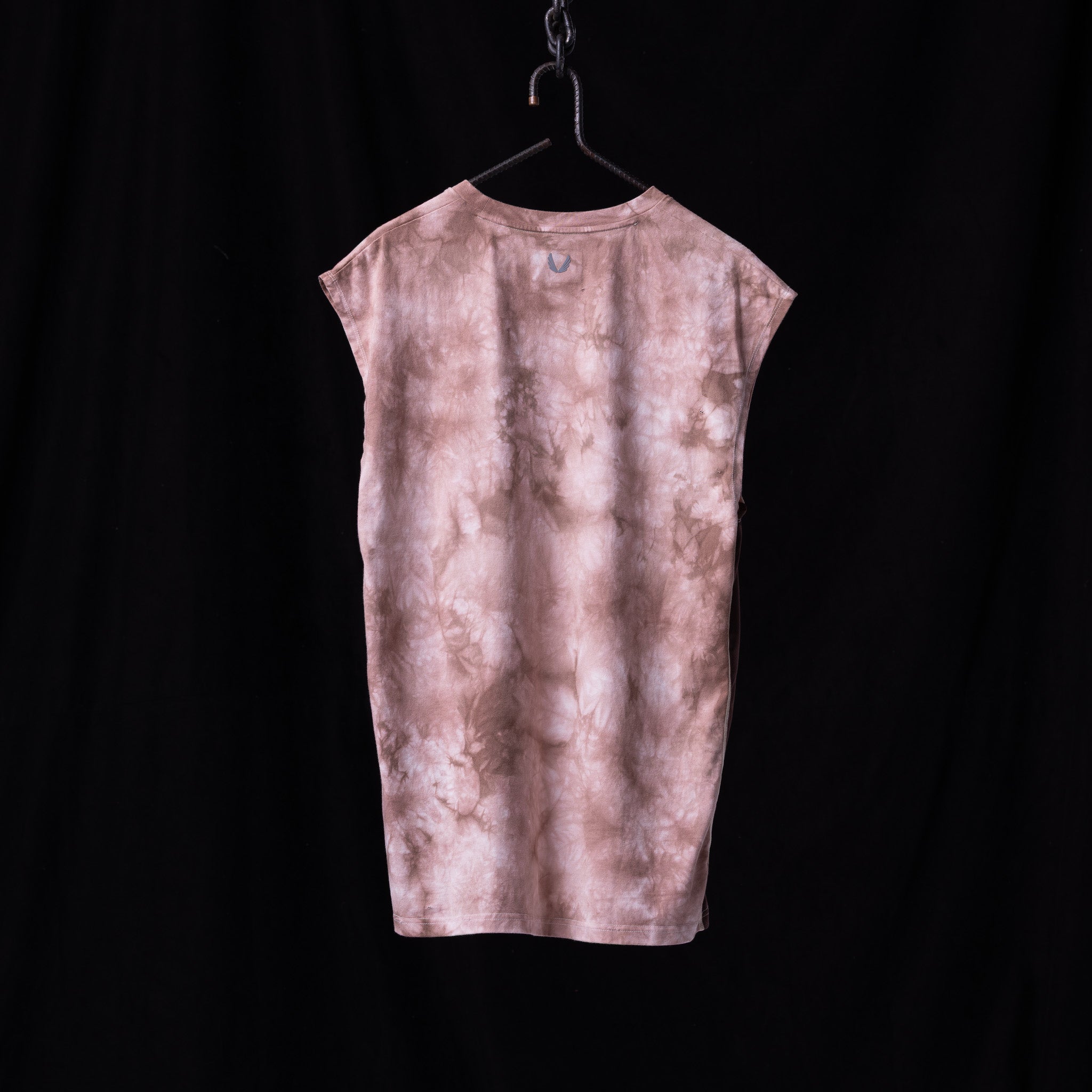 Flatlay of 2020 Tie Dye Cutoff Tank in mauve pink, back view