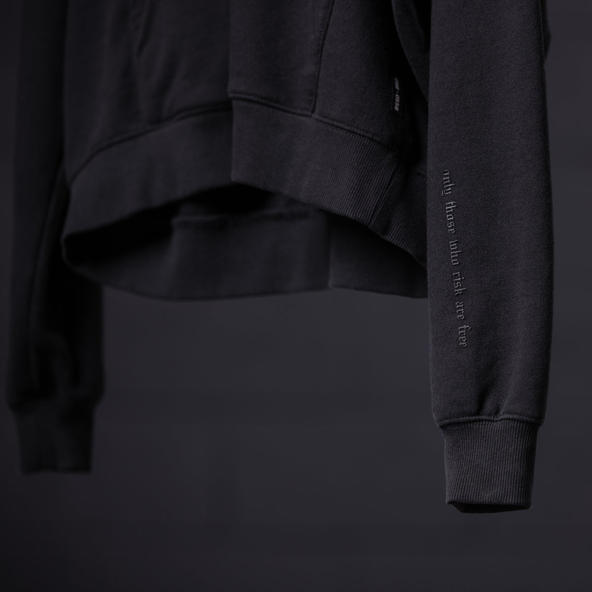 FA'20 Contrast Thread Hoodie in black, detail view of sleeve and cuff