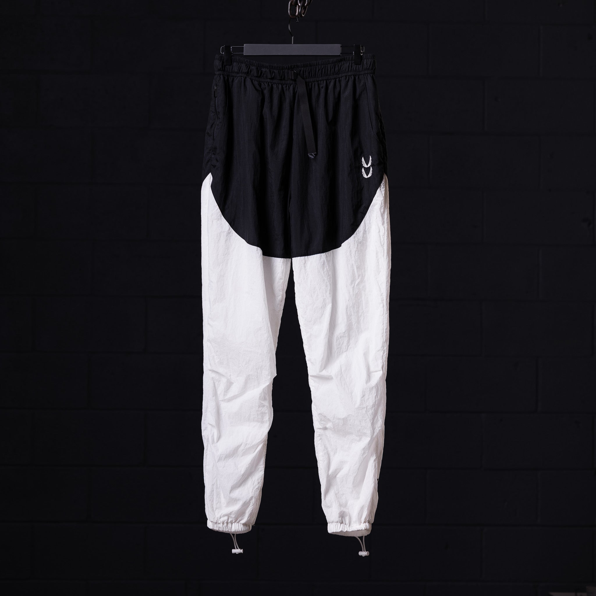 of 2021 Oversized Track Pant in black and white colorblock, front view
