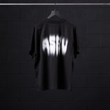 Black Tech Essential Relaxed Tee with Motion Blur design on hanger, back view