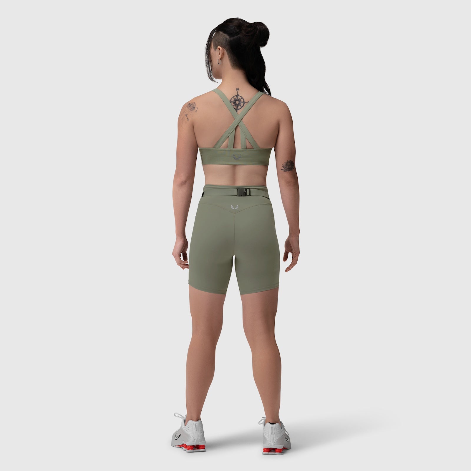 W039 Lycra Hybrid Sports Bra in sage, back view on model with matching shorts