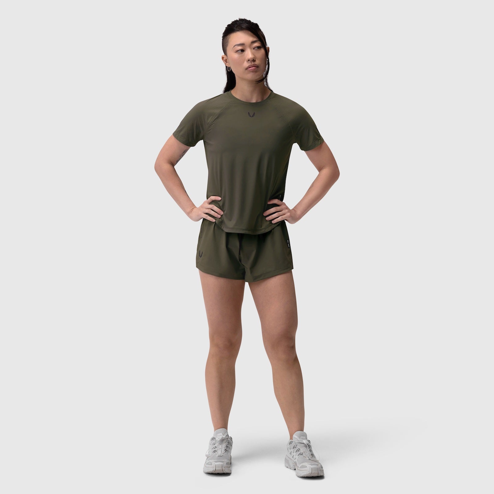 Laser-Vent Established Tee in olive worn with matching shorts, front view