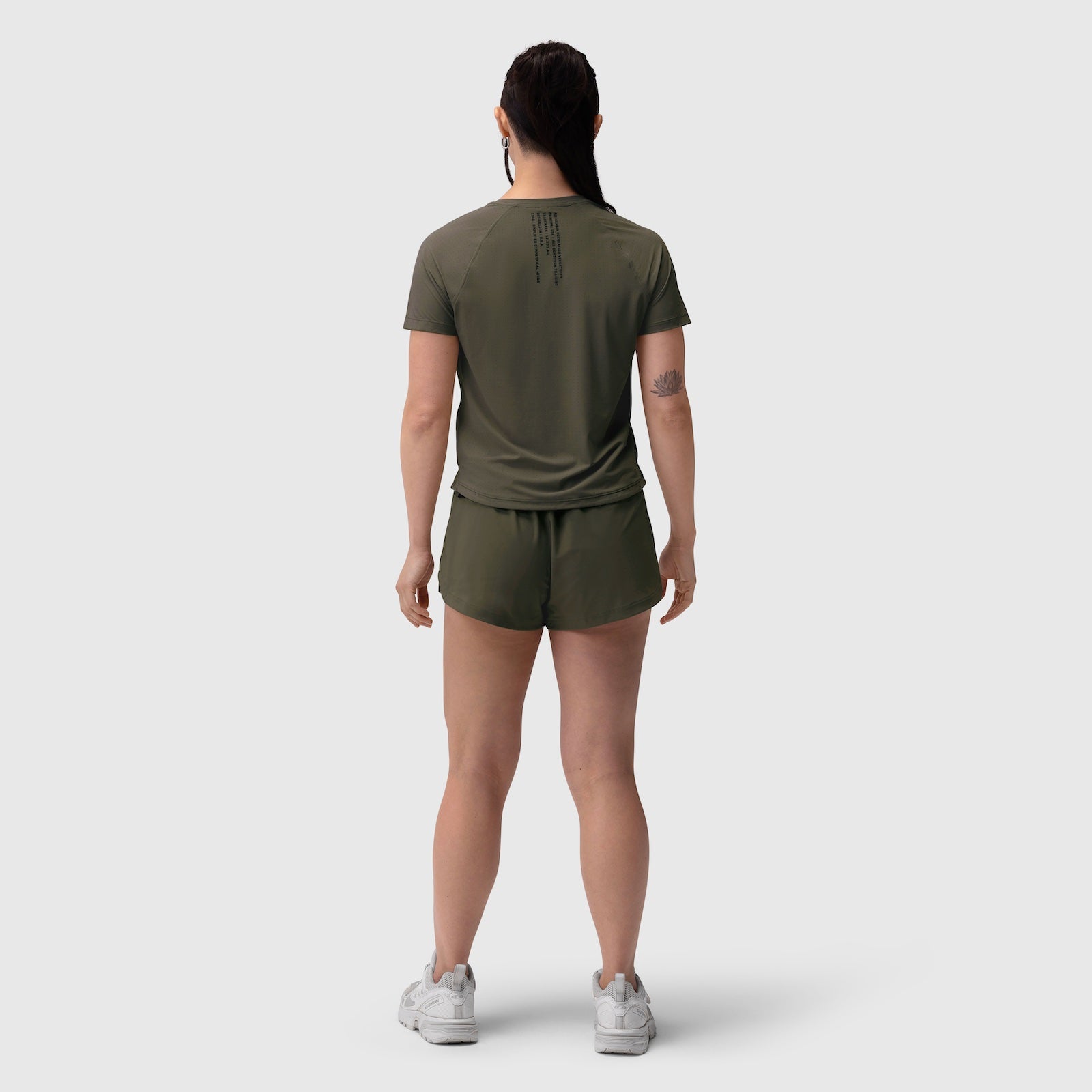 W017 Laser-Vent Established Tee in olive worn with matching shorts, back view