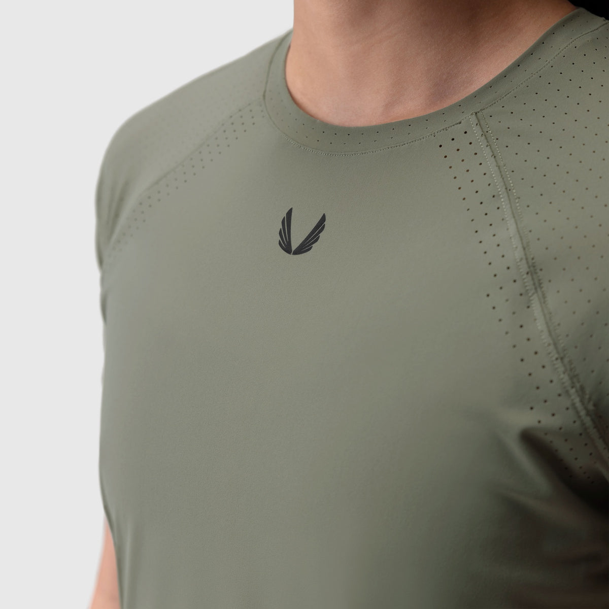 Laser-Vent Established Tee in sage worn by model, front view showing perforated fabric detail