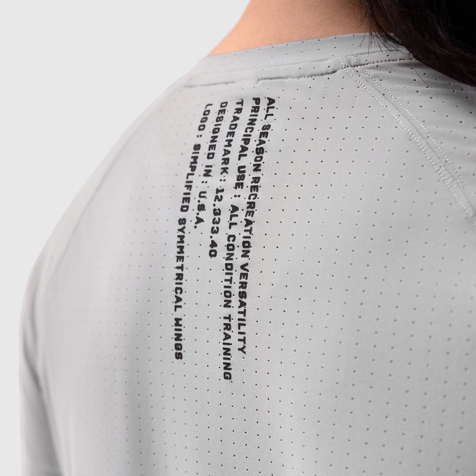 Laser-Vent Established Tee in Slate Grey worn by model, back view showing text detail