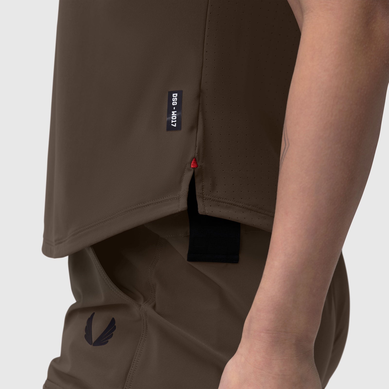 Laser-Vent Established Tee in Dark Earth worn by model, side detail view showing ventilation