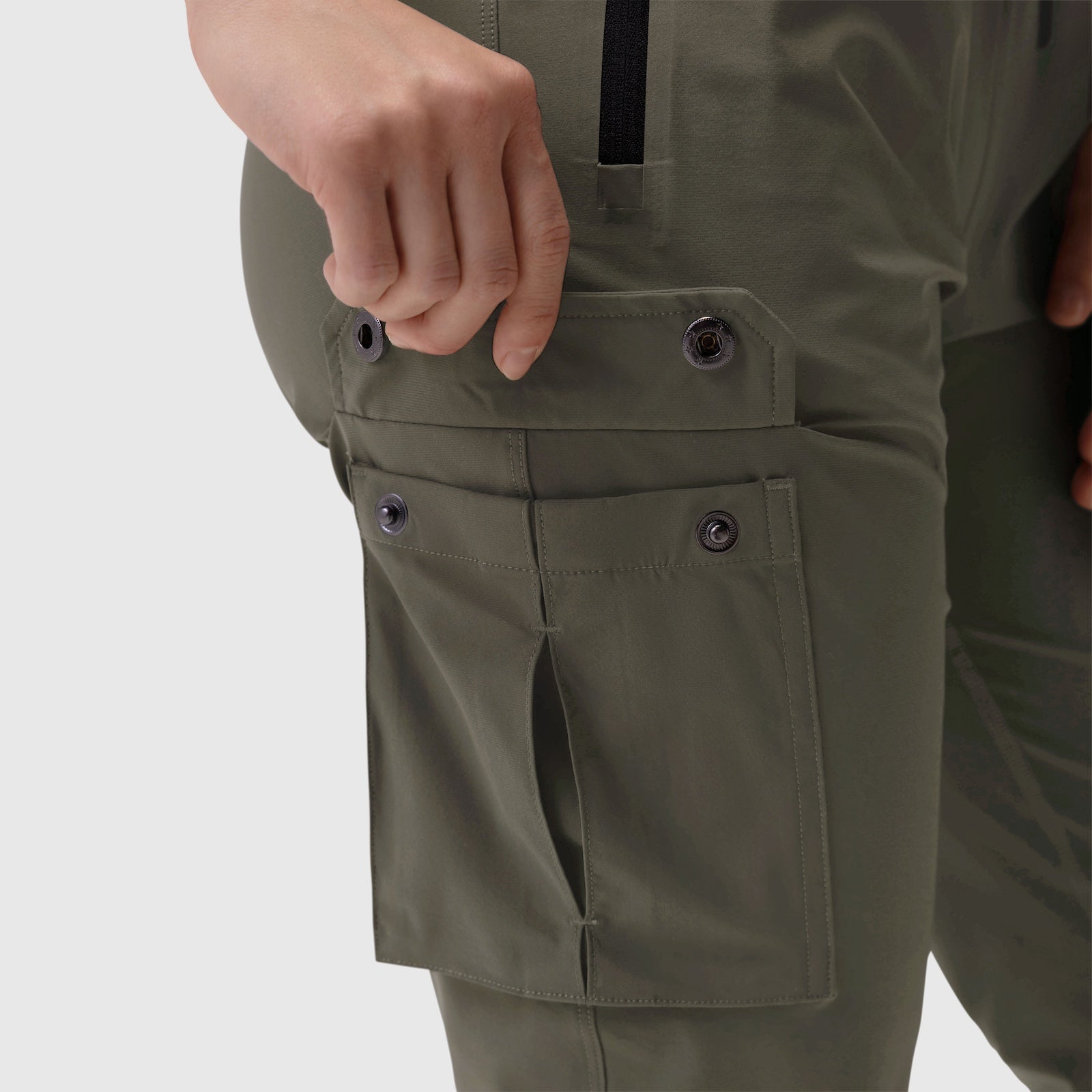 Tetra-Lite Cargo High Rib Jogger in olive, modeled on wearer showing cargo pocket detail