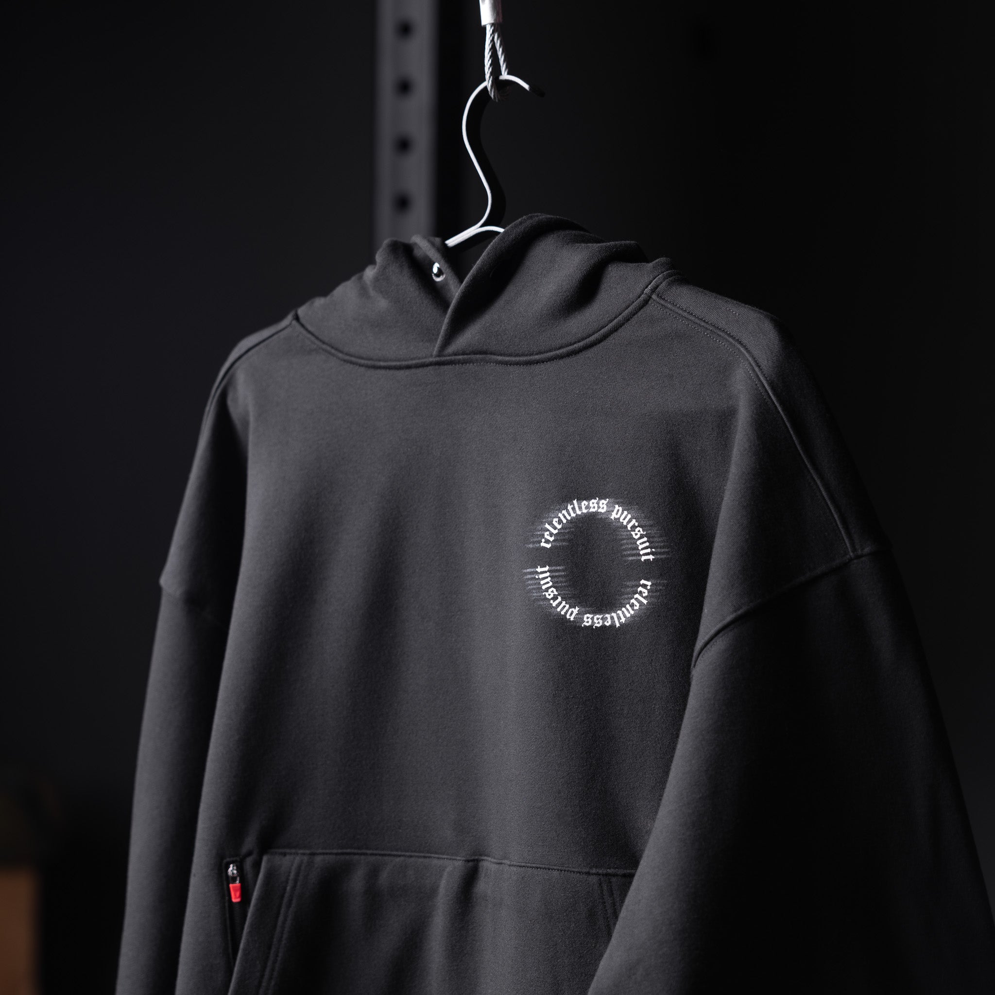 flatlay Tech-Terry Zip Pocket Hoodie in black with RP Blur design, front view