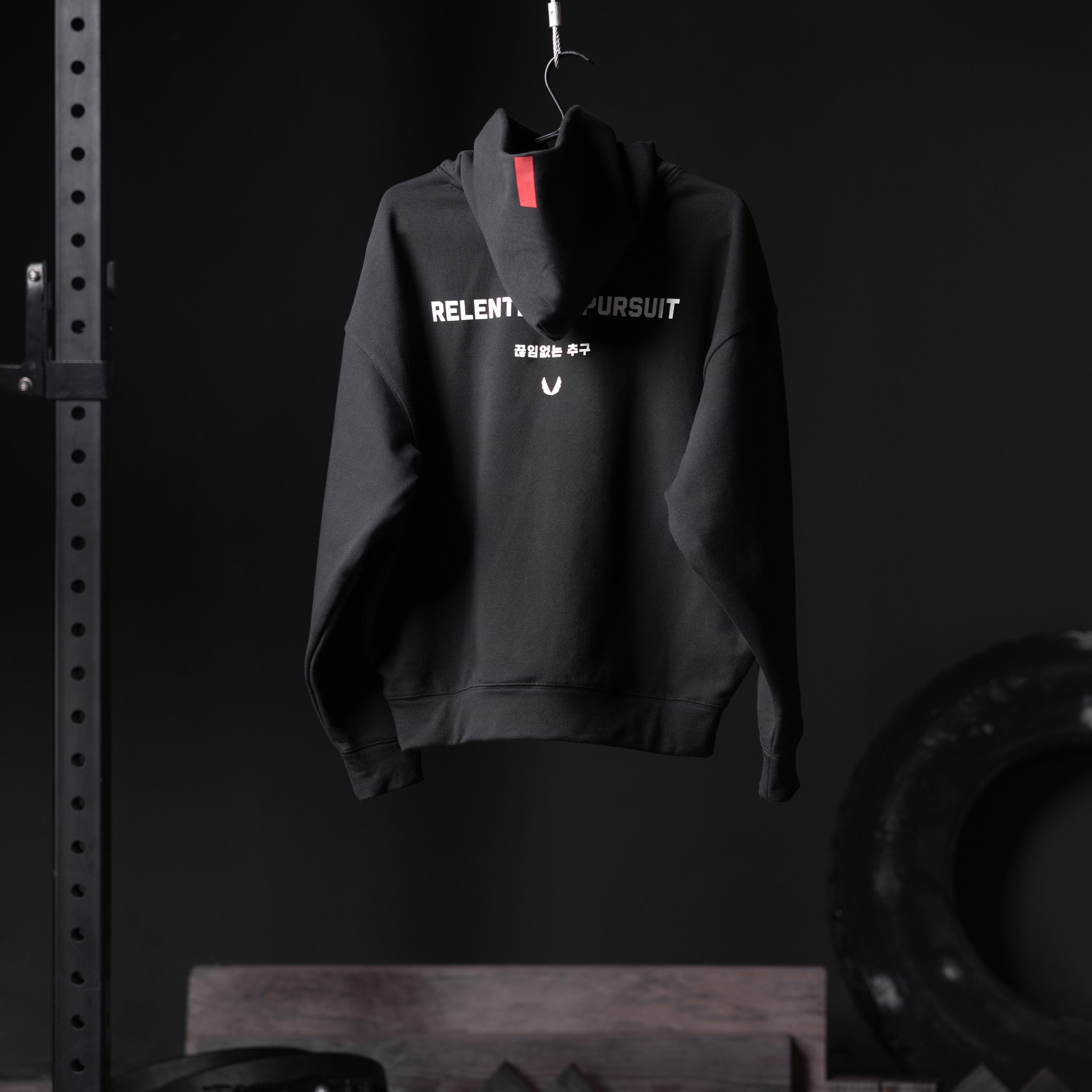 Flatlay Tech-Terry™ Zip Pocket Hoodie in black with RP Wings Stack graphic, front view