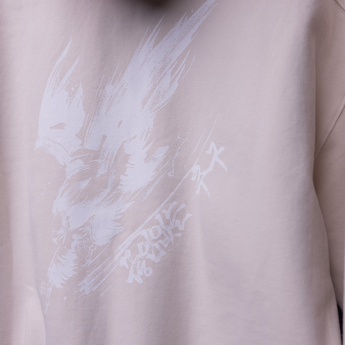 FA'22 Tech Terry Eagle Hoodie in light pink, worn on model showing front graphic detail