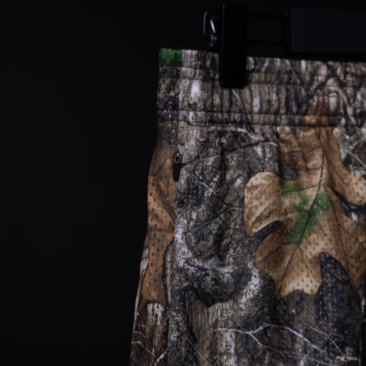 Training Division Mesh Shorts in camo pattern, worn with camouflage fabric detail