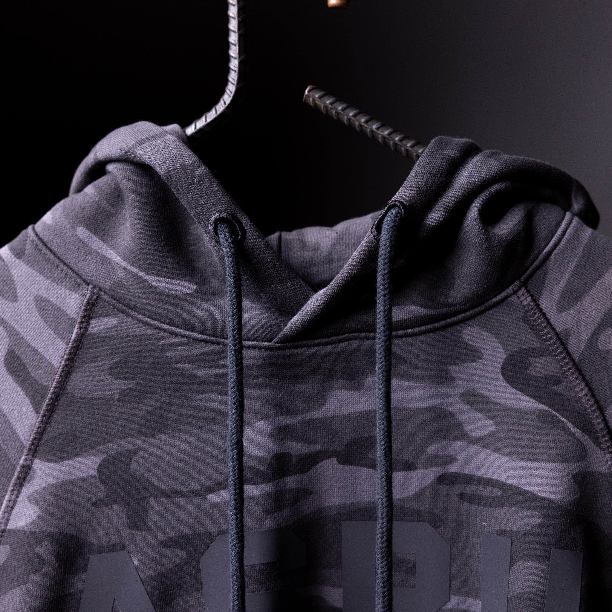 WN'19 RainPlus® Hoodie in purple camo, front detail shot showing drawstrings and hood
