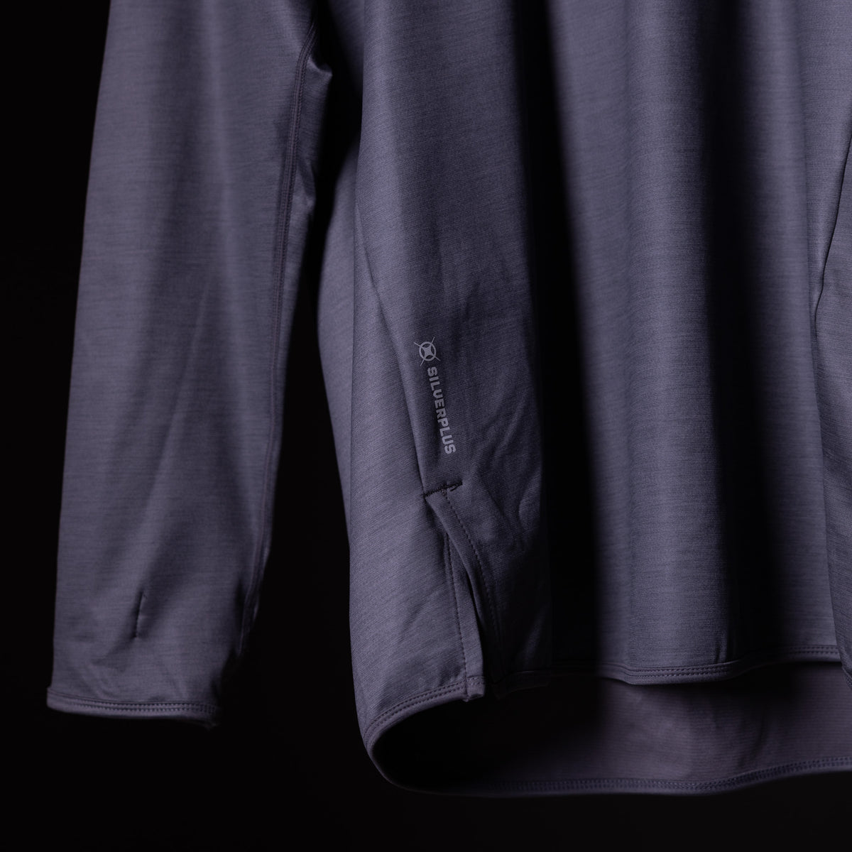 SM'18 Quarter Zip Hoodie in dark blue, detail shot of side seam and fabric texture