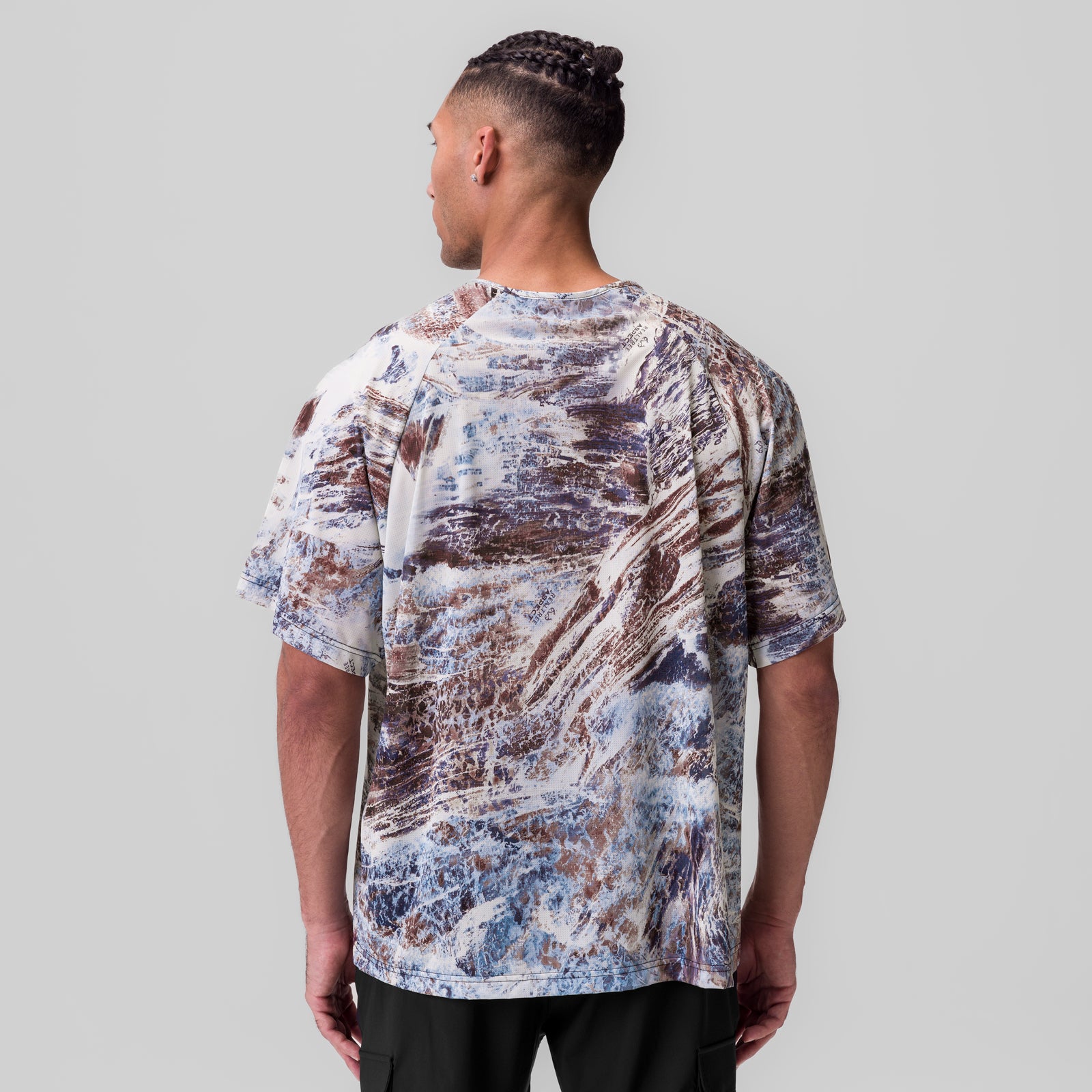 Ice-Skin Oversized Tee in brown/blue marble print, worn by model, back view