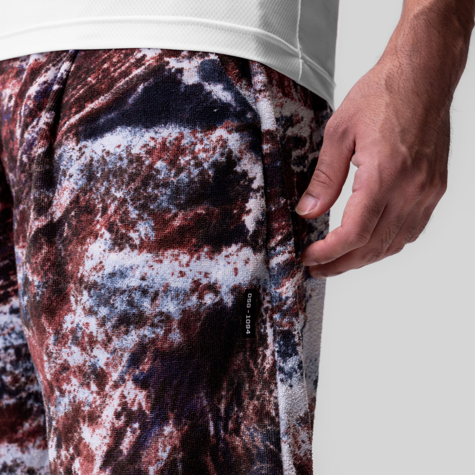 Towel Terry Relaxed Short in burgundy camo, worn on model showing side pocket detail