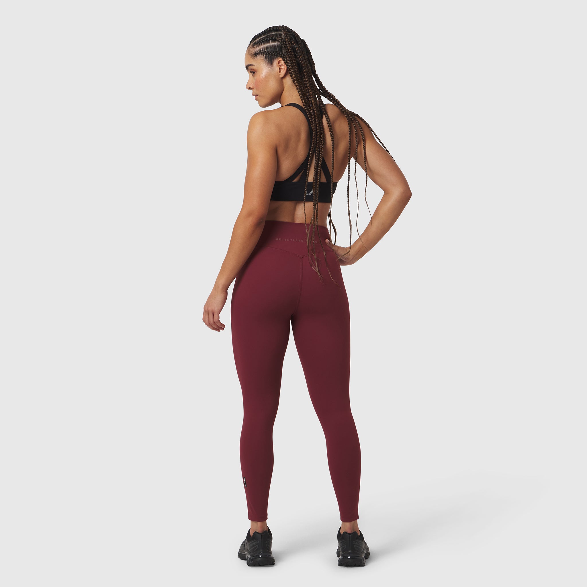 W002. LYCRA® ADAPTIV Legging in crimson, back view on model