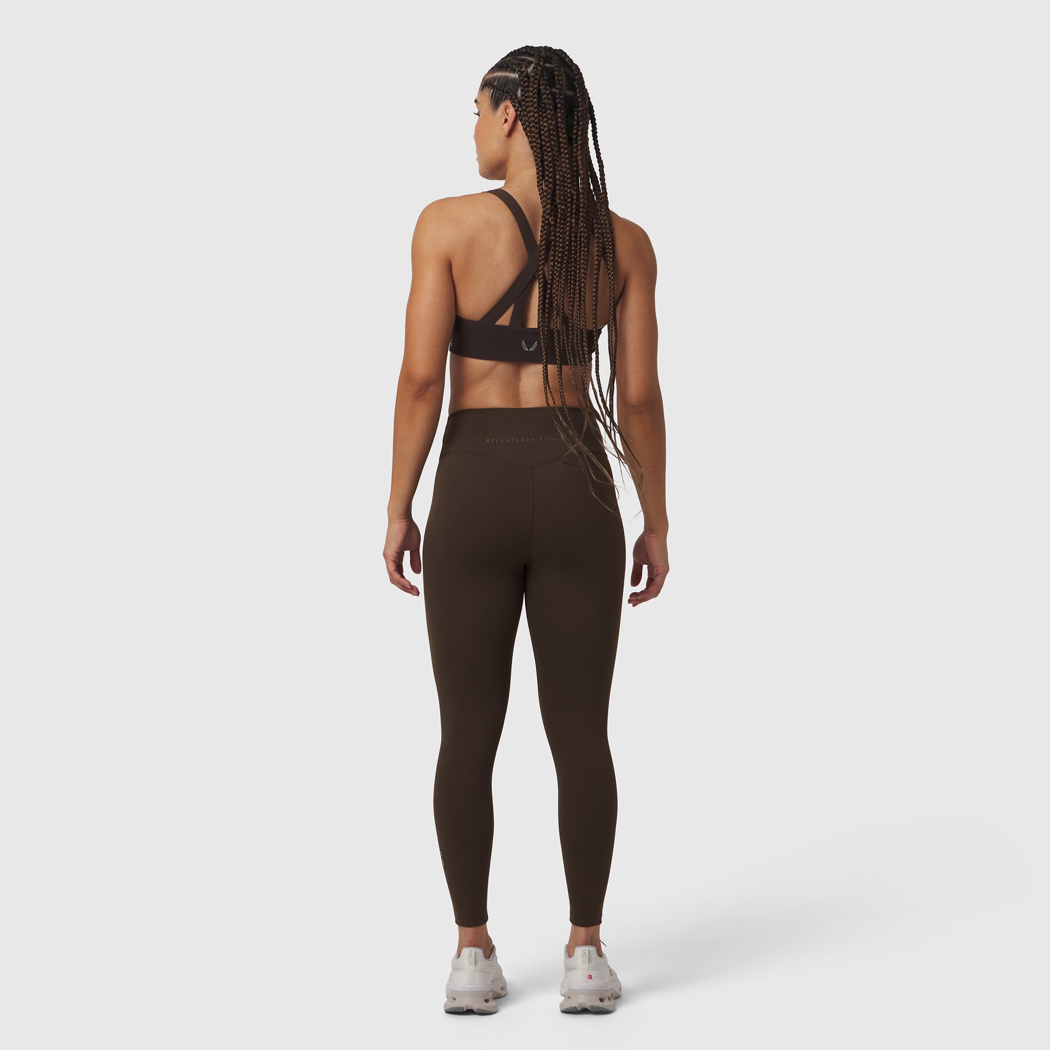 W002 LYCRA® ADAPTIV Legging in Dark Earth, back view on model