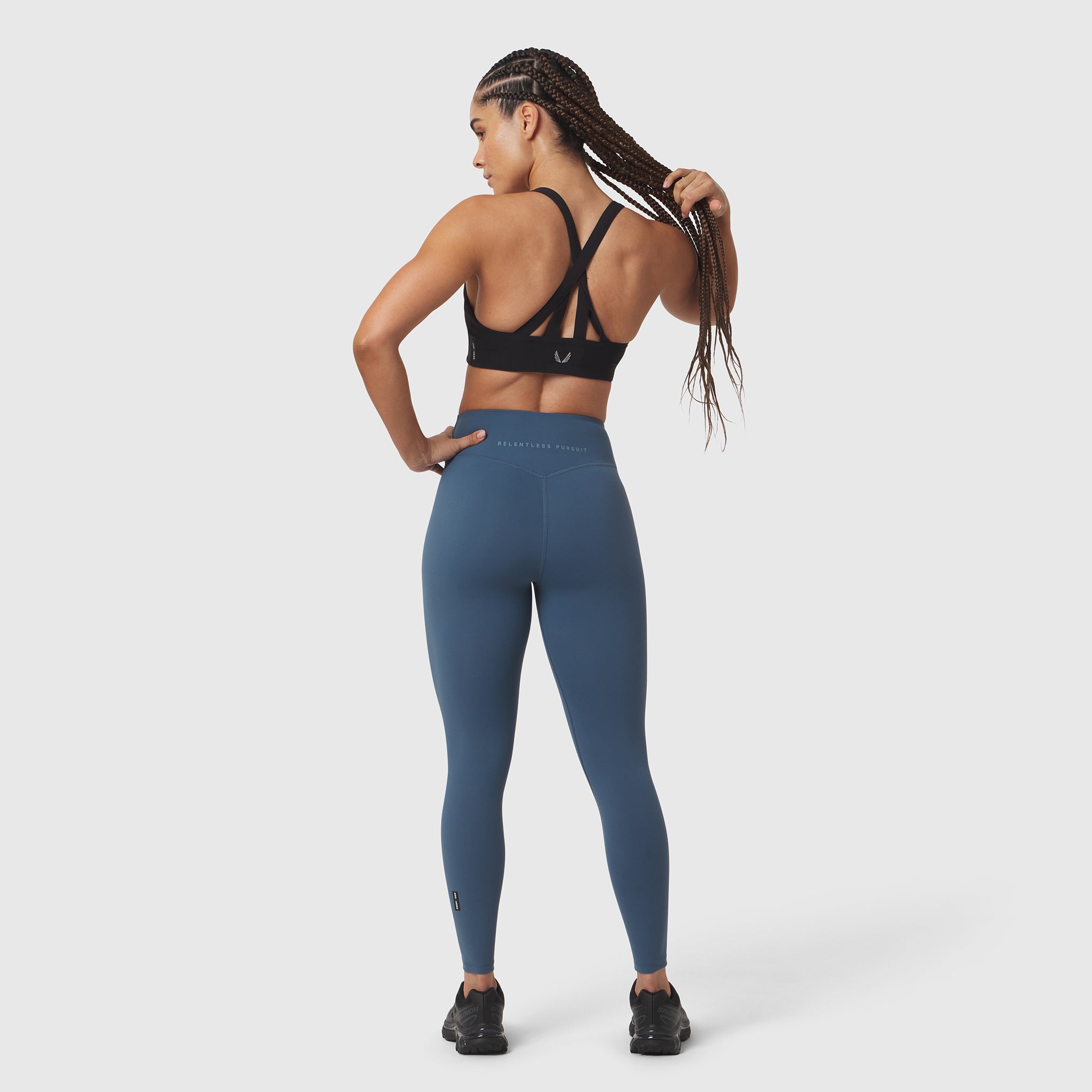 W002 LYCRA® ADAPTIV Legging in storm blue, rear view on model