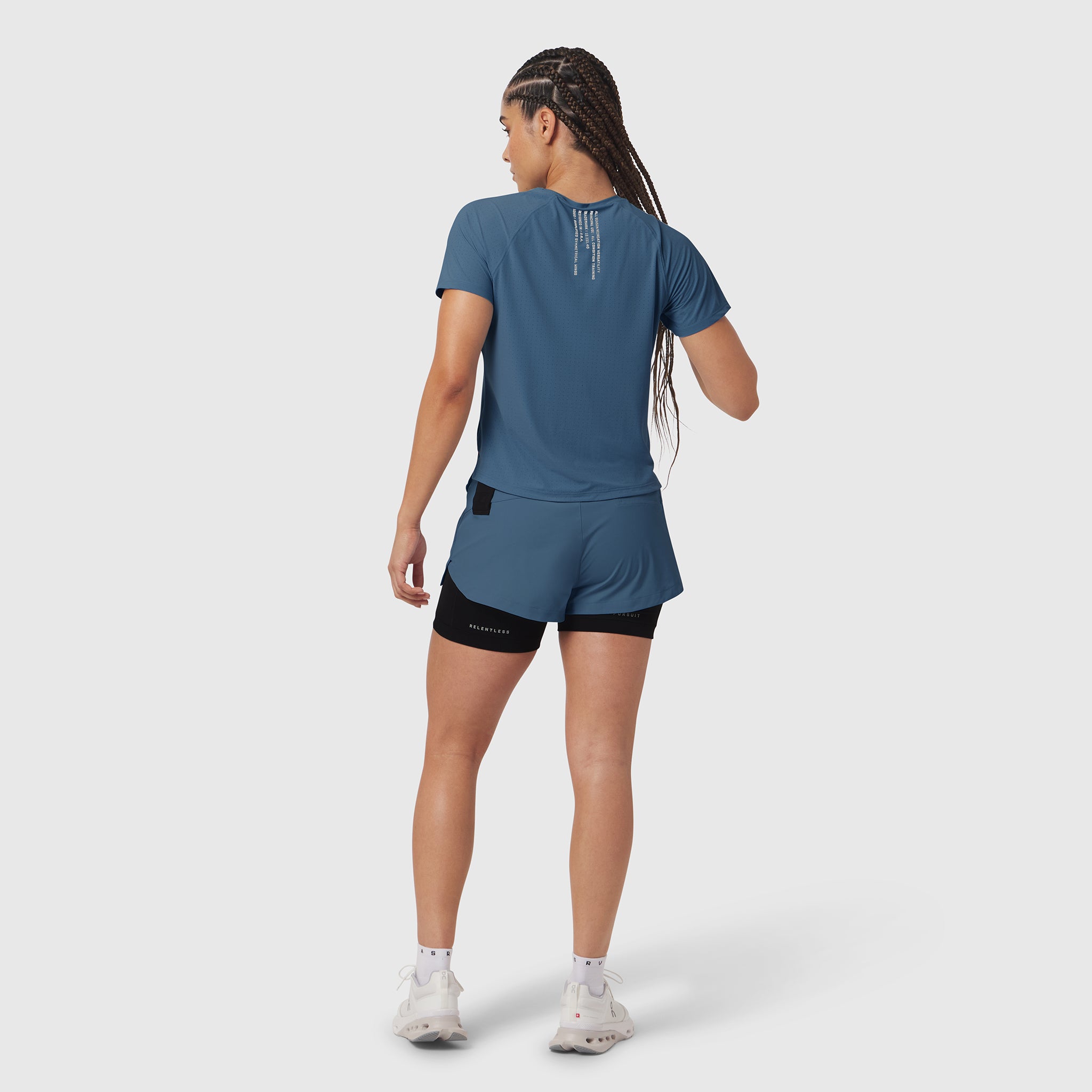 Laser-Vent Established Tee in storm blue, worn by model from behind while running