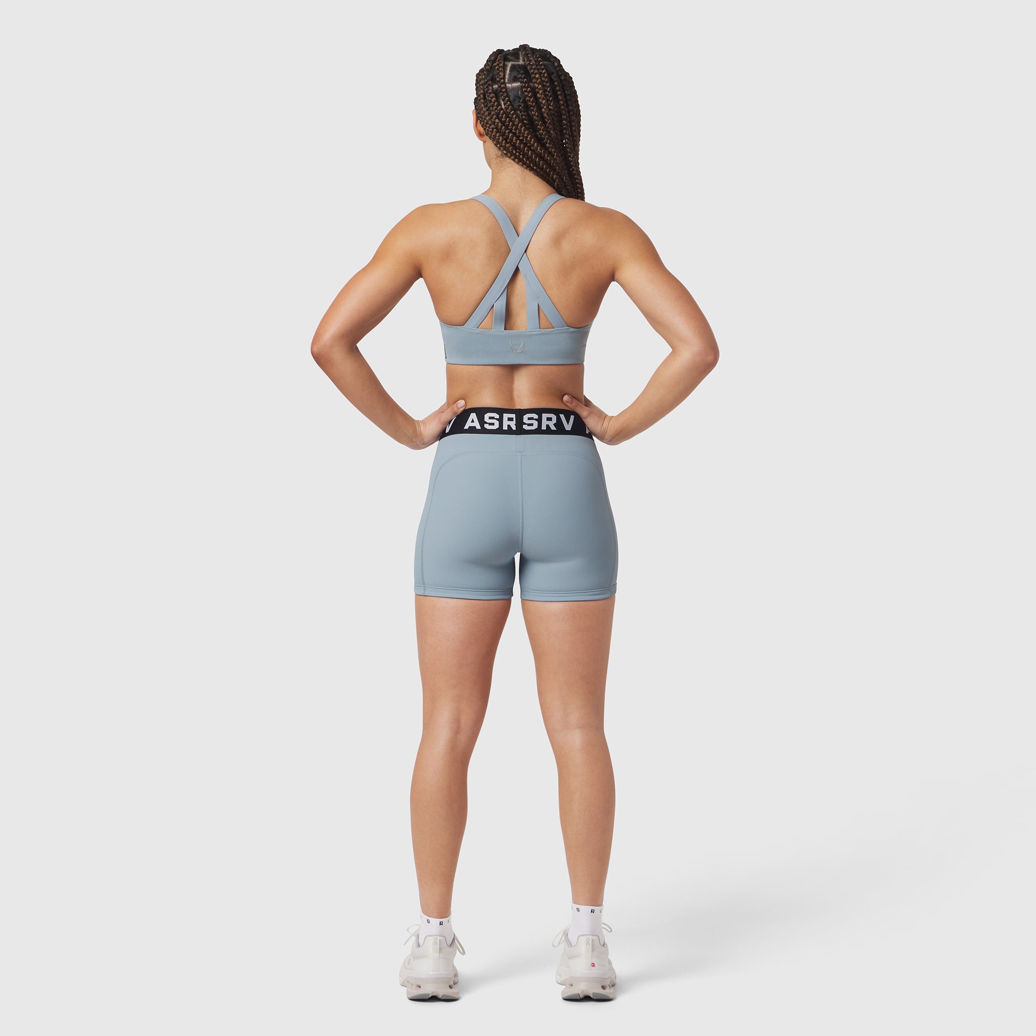 W027 Lycra Ribbed Short in light sky, rear view on model