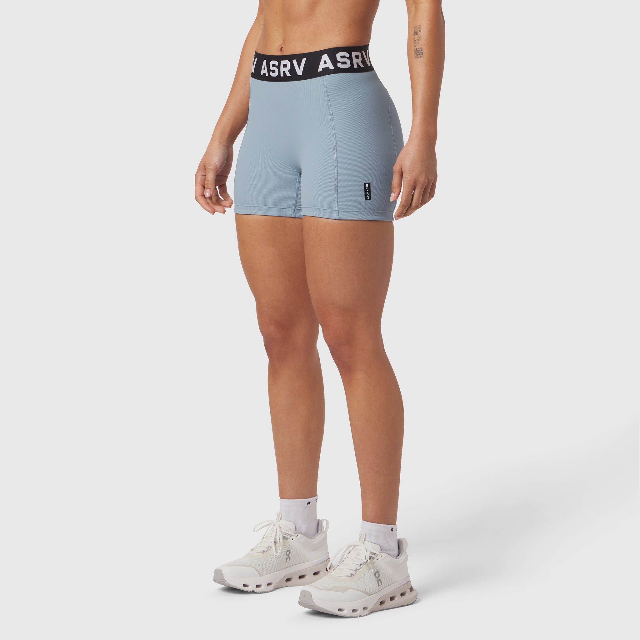 ASRV Lycra Ribbed Short in light sky blue, worn by model with white sneakers