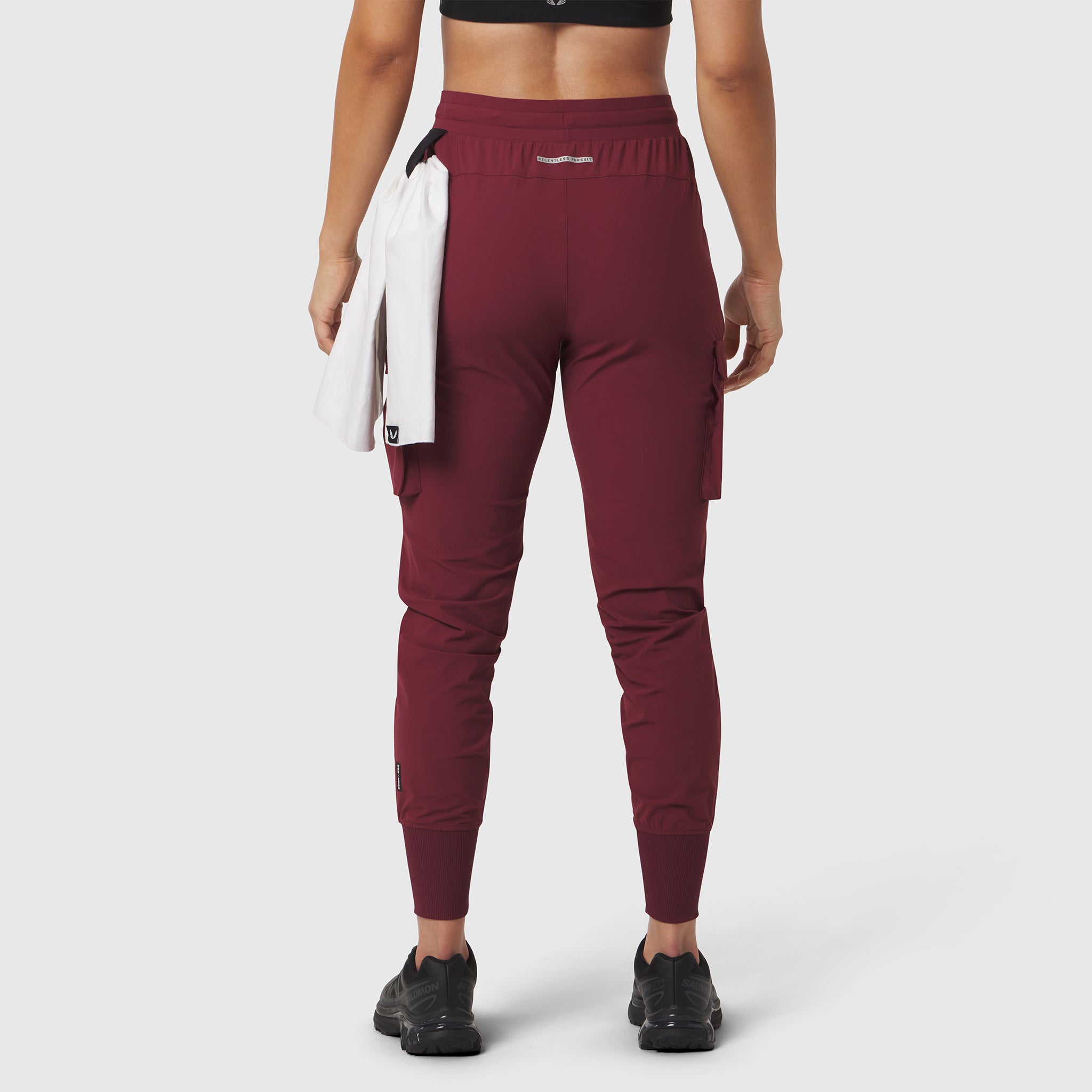 W032 Tetra-Lite Cargo High Rib Jogger in crimson, rear view on model