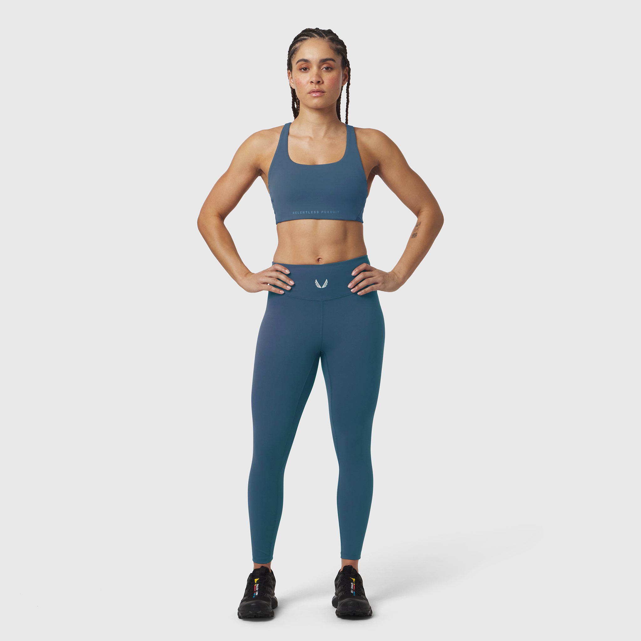 W039 Lycra Hybrid Sports Bra in storm blue, front view on model