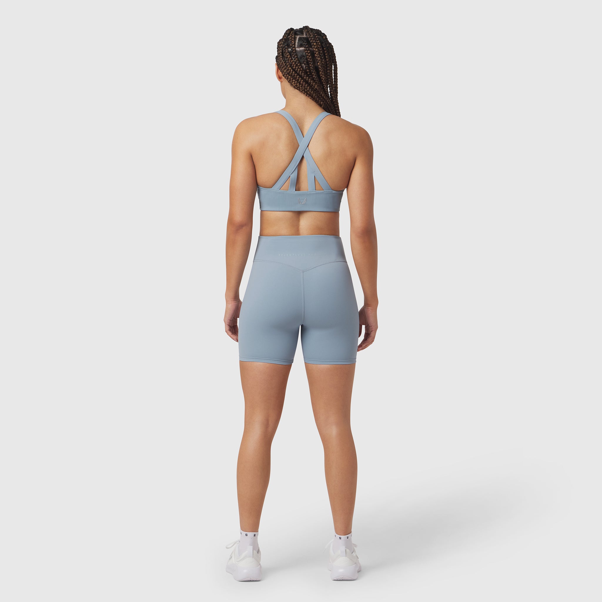 LYCRA® ADAPTIV Biker Short in Light Sky, back view on model