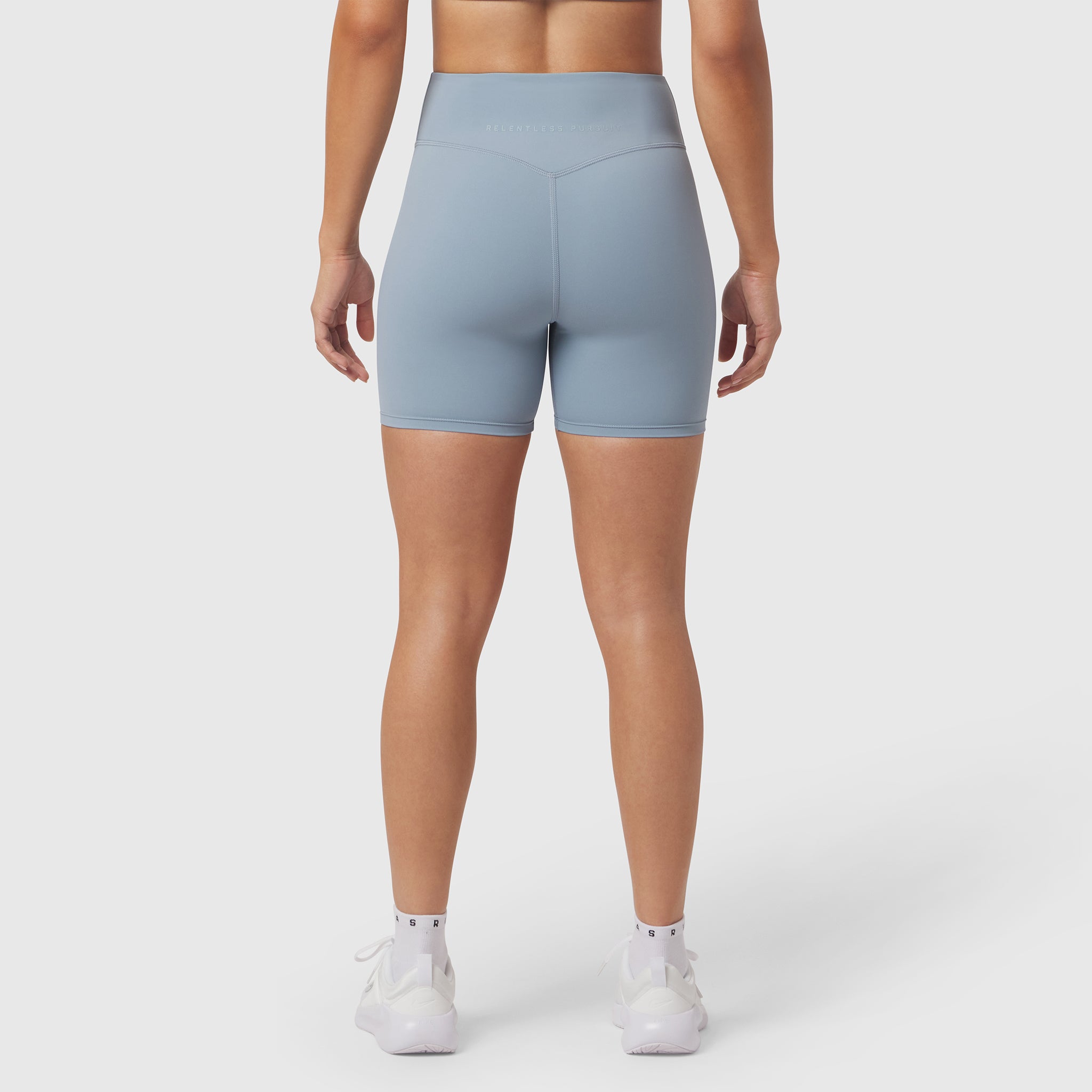 LYCRA® ADAPTIV Biker Short in Light Sky, back view on model