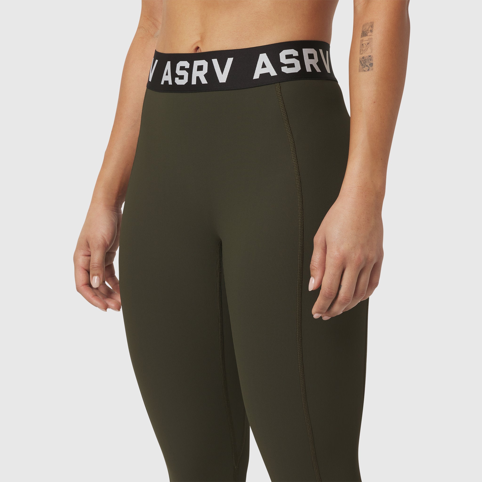W071 Lycra Ribbed Legging in olive worn by model, waist detail view